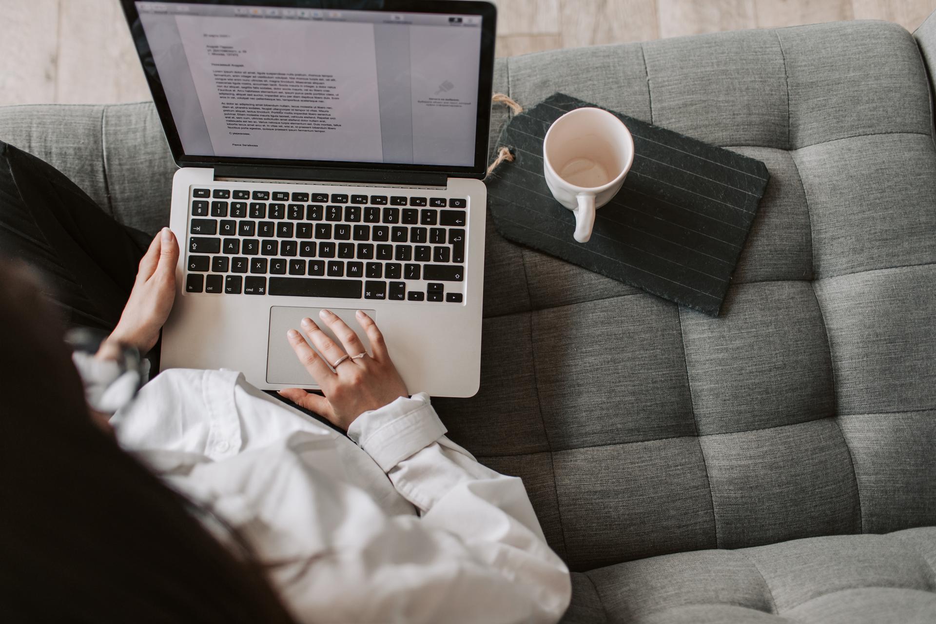 woman working on her laptop at home